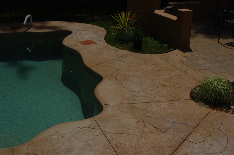 Swimming pool and stamped concrete project example 109